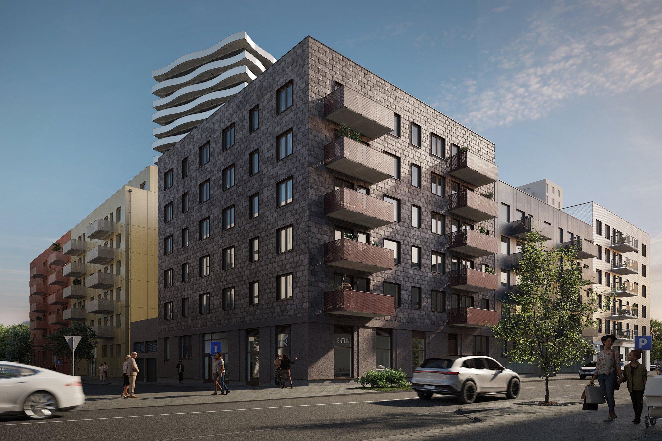 Bostadskvarter med bruna, gula och röda fasader.