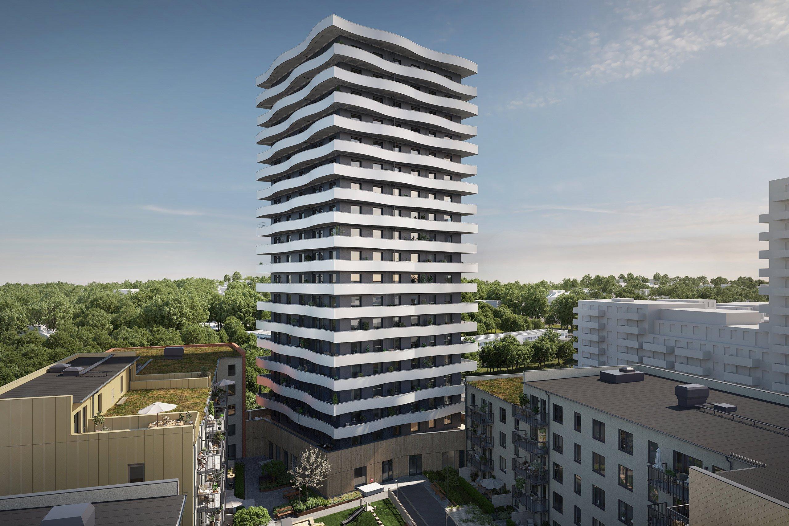 Vitt höghus med böljande balkonger.