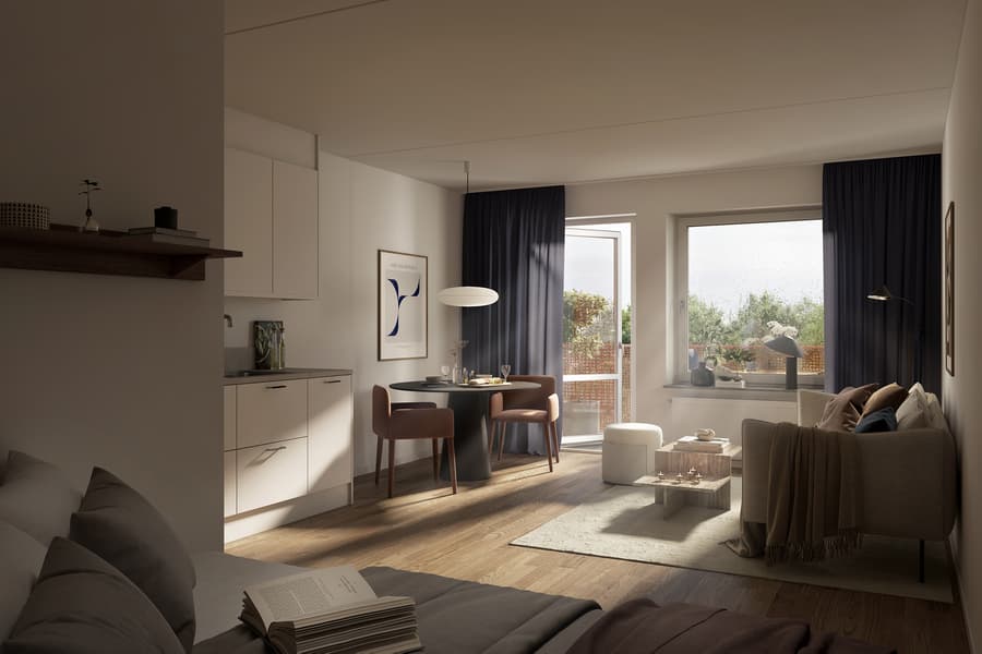 Kök och vardagsrum mot solig balkong.