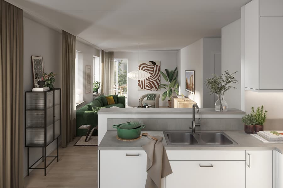 Vitt kök mot ljust vardagsrum med stora fönster.